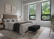 Thumbnail 23 of 28 - a bedroom with a bed and two windows