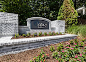 Thumbnail 32 of 43 - a sign for legacy at the entrance of a garden