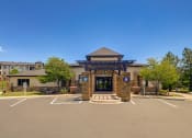 Thumbnail 32 of 37 - parking lot and building entrance at The Fletcher Southlands, Aurora, CO