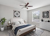 Thumbnail 27 of 39 - A bedroom with a bed, a ceiling fan, and two wall art pieces.