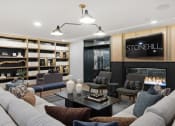 Thumbnail 35 of 65 - a living room filled with furniture and a fireplace at Stonehill at West Orange, West Orange, New Jersey