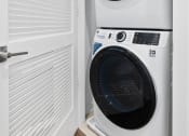 Thumbnail 13 of 65 - a white washer and dryer in a laundry room at Stonehill at West Orange, New Jersey, 07052