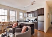 Thumbnail 1 of 17 - a kitchen and living room at 1841 Columbia Road Apartments, Washington, 20009