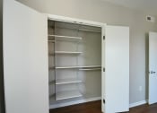 Thumbnail 14 of 27 - a walk in closet in a 555 waverly unit
