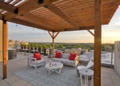 Thumbnail 16 of 21 - a roof deck with couches and tables at 3333 Wisconsin, Washington