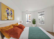 Thumbnail 23 of 66 - A bedroom with a bed, a painting, a window, and a potted plant.
