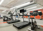 Thumbnail 3 of 17 - a room filled with lots of exercise equipment