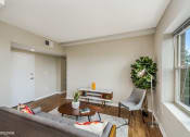 Thumbnail 4 of 27 - a living room with a couch and two chairs