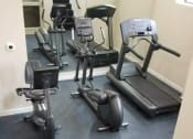 Thumbnail 14 of 19 - a room filled with lots of different types of exercise equipment