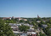 Thumbnail 11 of 19 - a city filled with lots of buildings and trees