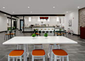 Thumbnail 4 of 30 - A white table with orange chairs is in the foreground of a room with a bar in the background.