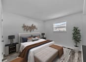 Thumbnail 7 of 15 - A bedroom with a large bed and a decorative wall piece.