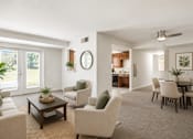 Thumbnail 2 of 38 - A living room with a sofa, chairs, and a coffee table.