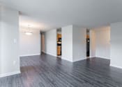 Thumbnail 24 of 29 - A room with white walls and a wooden floor at Charlestowne North Apartments, Greenbelt, MD, 20770