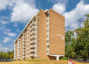 Thumbnail 11 of 29 - A tall brick building with the words at Charlestowne North Apartments, Greenbelt, MD, 20770