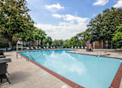Thumbnail 43 of 49 - Swimming Pool With Lounge Chairs at Columbia Pointe, Columbia, Maryland 