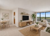Thumbnail 6 of 18 - A living room with a flat screen TV, a coffee table, a couch, a dining table, and a view of the outdoors through a large window.