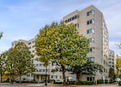 Thumbnail 23 of 24 - Exterior with Trees at Carillon House Apartments, Washington, District of Columbia
