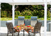 Thumbnail 16 of 18 - outdoor grilling and barbecue area at Colesville Towers Apartments, Silver Spring, MD 20910