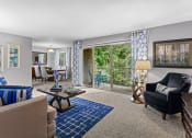 Thumbnail 6 of 17 - Living Room With Balcony at Versailles Apartments, Towson