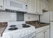 Thumbnail 11 of 18 - Updated Kitchens and Gas Range at Park Crescent, Washington, 20009