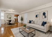 Thumbnail 1 of 37 - Furnished living and dining room with modern decor at University Landing Apartments, Maryland