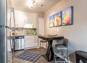 Thumbnail 3 of 17 - Dining And Kitchen at Versailles Apartments, Towson, 21204