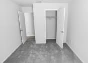 Thumbnail 5 of 13 - an empty room with white walls and a closet at Retreat at Savannah, Georgia, 31404