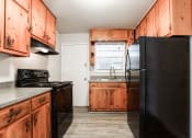 Thumbnail 24 of 29 - 1295 West Atlanta apartments with black appliances