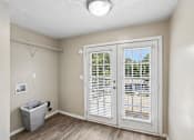 Thumbnail 12 of 37 - Room with glass doors
