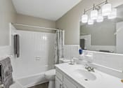 Thumbnail 6 of 37 - Bathroom with white fixtures