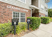 Thumbnail 20 of 31 - A building with a sign that says Leasing Center.