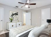 Thumbnail 7 of 37 - a spacious bedroom with a ceiling fan  at Avenues of Kennesaw East & West, Georgia