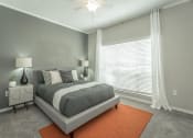 Thumbnail 8 of 37 - a bedroom featuring a large window at avenues of kennesaw at Avenues of Kennesaw East & West, Kennesaw, GA 30144