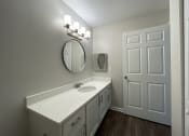Thumbnail 36 of 37 - bathroom with linen closet at Palmetto Place, Fort Mill, SC