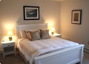 Thumbnail 13 of 15 - Bedroom with cozy bed at Summit Terrace, South Portland, Maine
