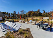 Thumbnail 18 of 27 - the outdoor patio at the whispering winds apartments in pearland, tx
