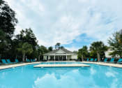 Thumbnail 1 of 26 - Resort-inspired pool at Oasis at Cedar Branch in Wilmington, NC