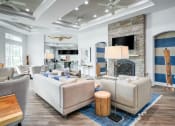 Thumbnail 8 of 25 - a living room filled with furniture and a fire place  at Century Avenues, Florida