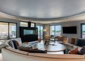 Thumbnail 13 of 28 - a living room filled with furniture and a flat screen tv  at Century West Pryor, Lee's Summit, MO