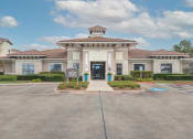 Thumbnail 22 of 29 - a large white building with a sign in front of it at Century South Shore, League City, Texas