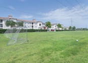 Thumbnail 9 of 29 - a soccer field at the whispering winds apartments in pearland, tx at Century South Shore, League City