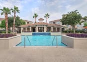 Thumbnail 1 of 29 - a pool with a building in the background  at Century South Shore, League City, Texas