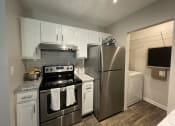 Thumbnail 20 of 37 - modern kitchen featuring stainless steel appliances at Palmetto Place, Fort Mill