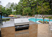 Thumbnail 44 of 46 - Grill Station at The Carter 4250 Apartments, Georgia 30093