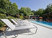 Thumbnail 4 of 24 - Poolside Sundecks at 555 Mansell, Roswell, 30076