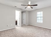 Thumbnail 42 of 81 - living room with a ceiling fan at Magnolia Place at Stockbridge Apartments, Stockbridge, GA, 30281