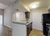 Thumbnail 18 of 33 - Kitchen And Living at The Hub at 934 Apartments, Atlanta, 30349