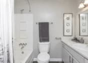 Thumbnail 20 of 37 - a white bathroom with a toilet and a sink at The Sapphire, Decatur, GA, 30035