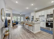 Thumbnail 4 of 39 - Kitchen at Century Mundy Mill Apartments, Oakwood 30566